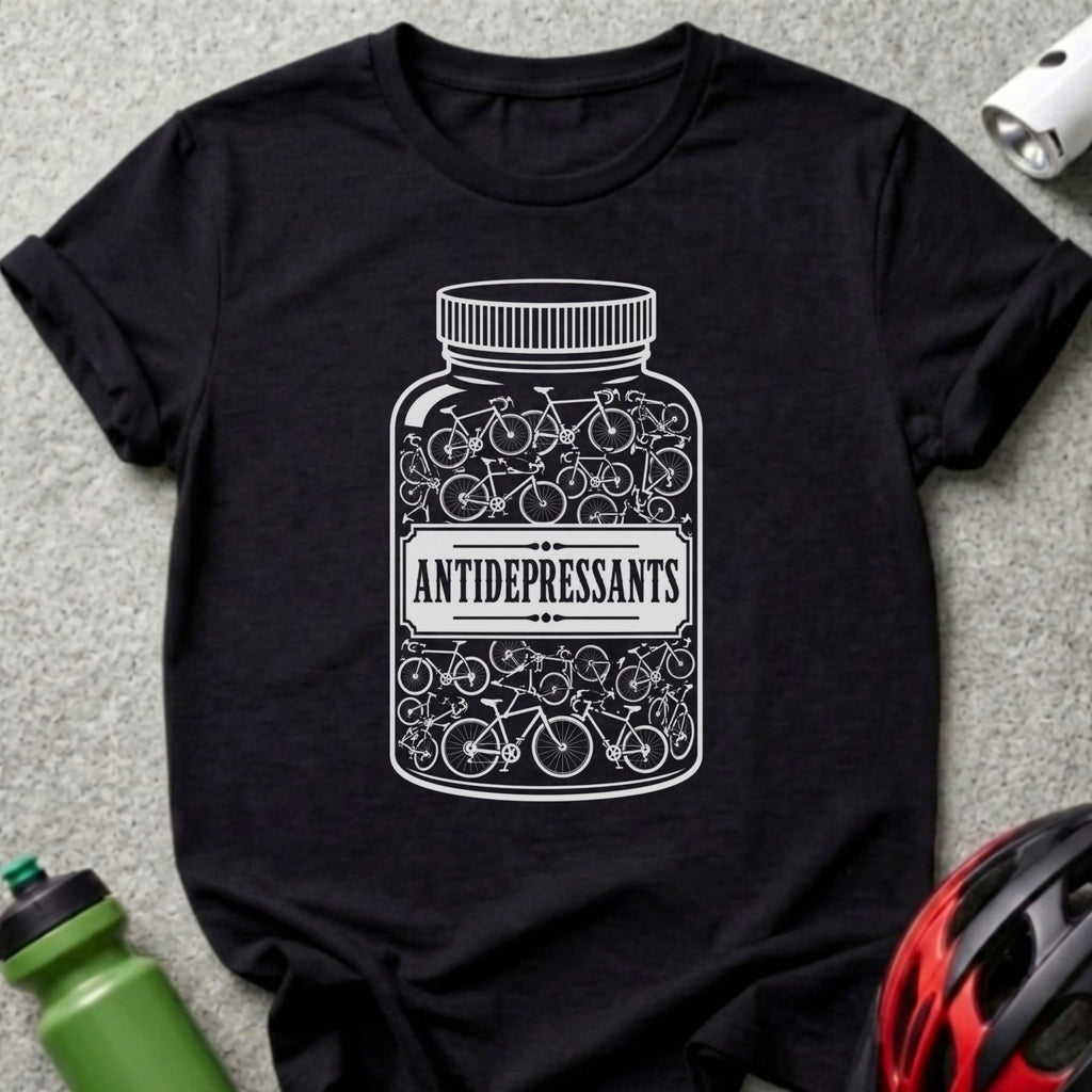 Black t-shirt with a white graphic of bicycles inside a pill bottle labeled "ANTIDEPRESSANTS".