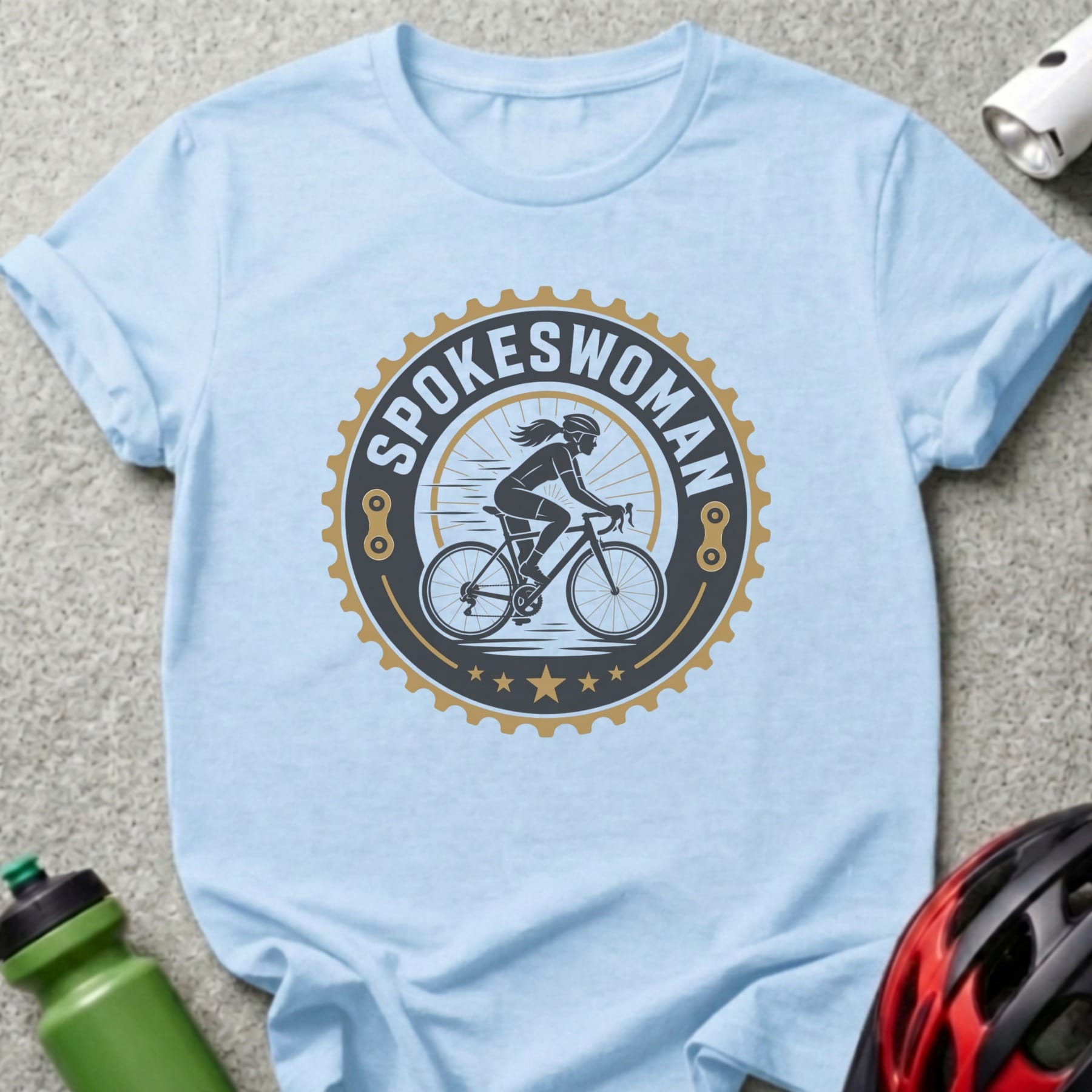 Light blue t-shirt with "SPOKESWOMAN" cycling graphic.