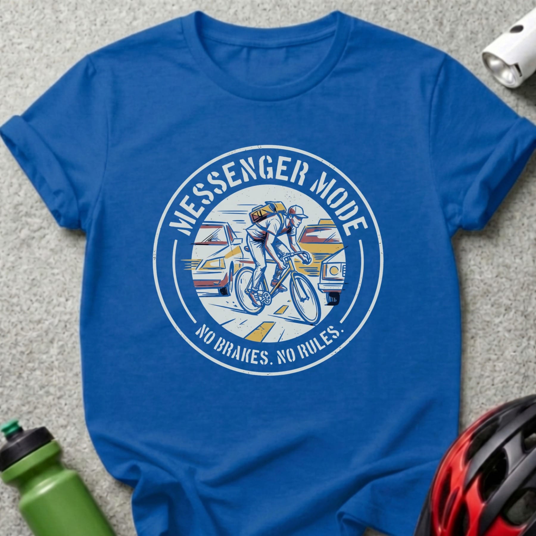 Blue t-shirt with "MESSENGER MODE NO BRAKES. NO RULES." graphic.