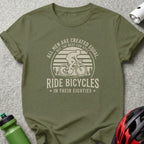 Olive green t-shirt with graphic: "All men are created equal, but the best can still ride bicycles in their eighties."
