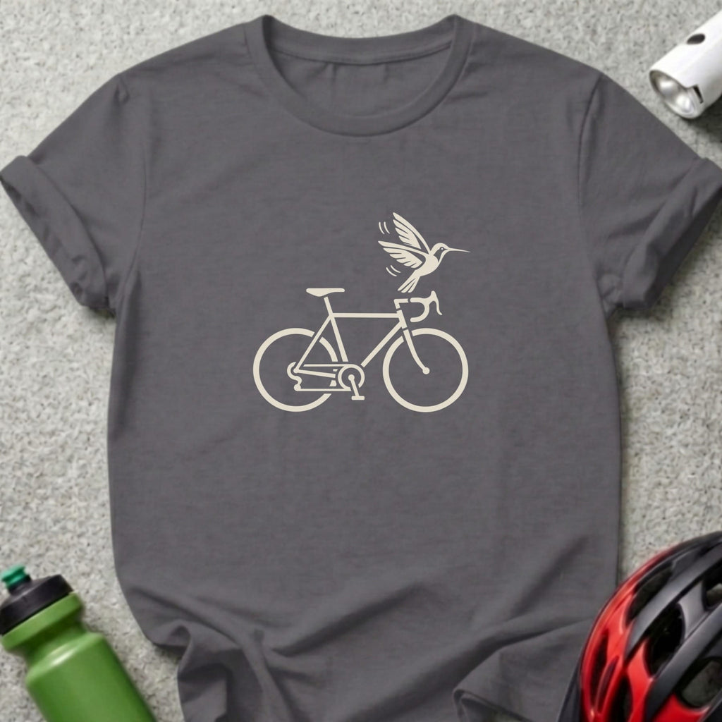A dark grey crewneck t-shirt featuring a white graphic of a bicycle with a hummingbird above it.