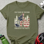 Olive t-shirt with "250 Years of Freedom" text and cyclist graphic.