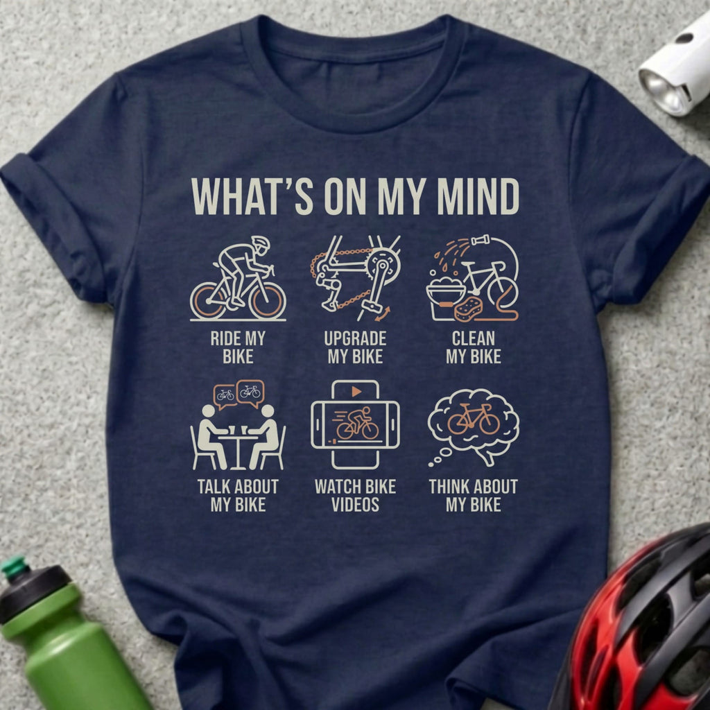 Navy t-shirt with six icons and text about cycling: ride, upgrade, clean, talk, watch, and think.