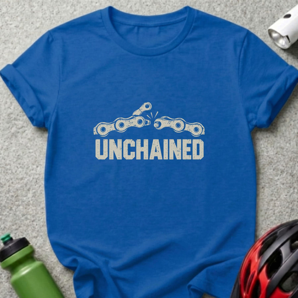 Royal blue t-shirt featuring a distressed white graphic of a broken bicycle chain above the text UNCHAINED.