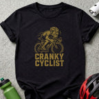 Black t-shirt with cartoon cyclist and text "CRANKY CYCLIST".