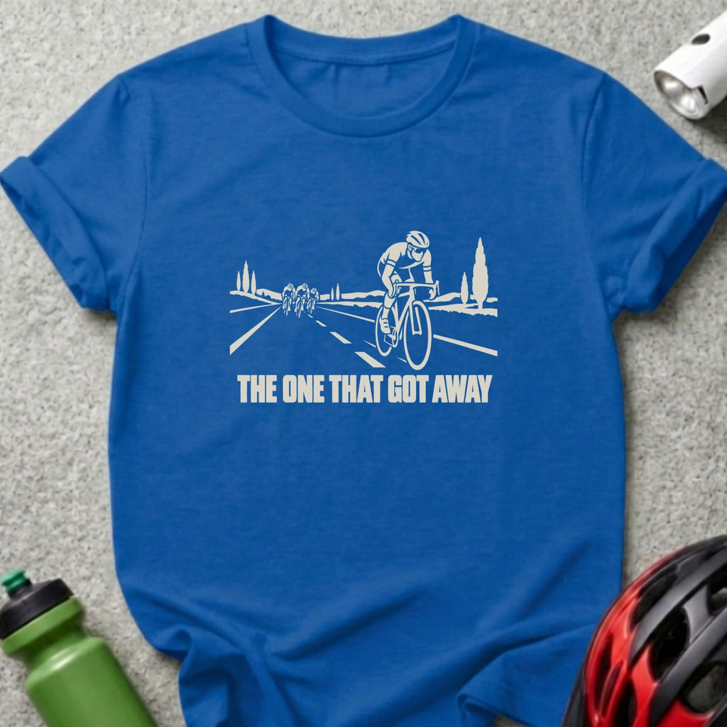 Blue t-shirt featuring a white graphic of cyclists on a road and the text THE ONE THAT GOT AWAY.