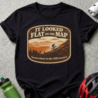 T-shirt with "It Looked Flat On The Map Somewhere in the Hill Country" and mountain biker graphic.