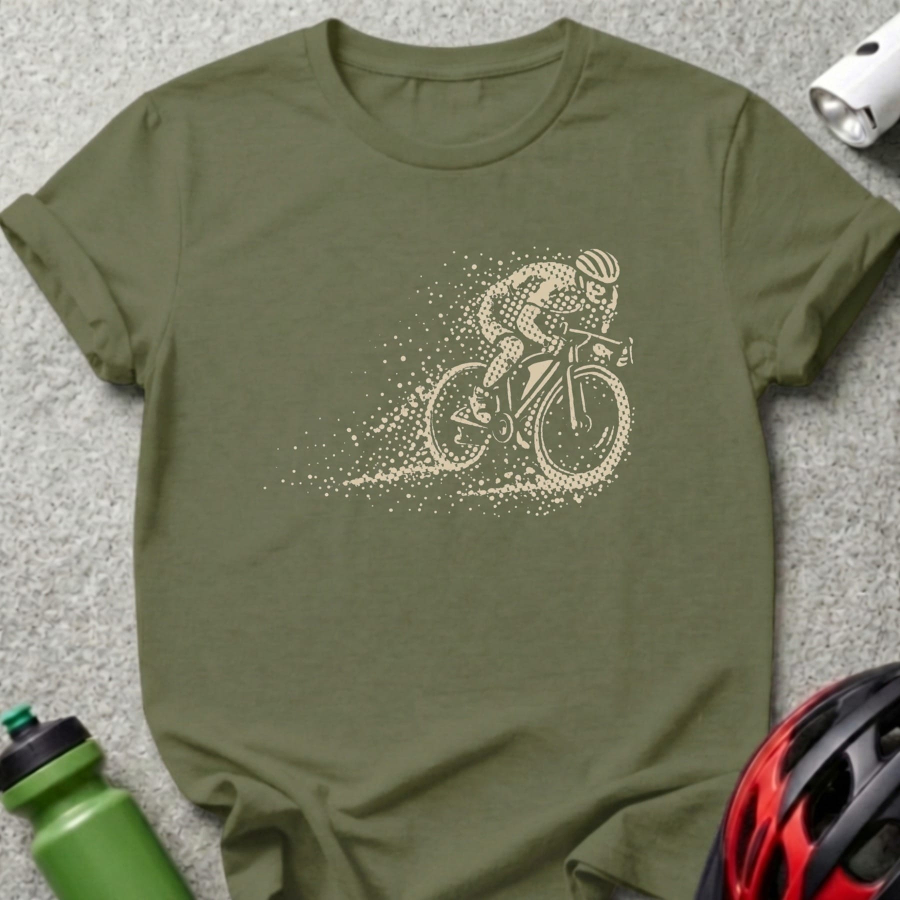 Olive green t-shirt with stylized cyclist graphic and speckled motion trail.