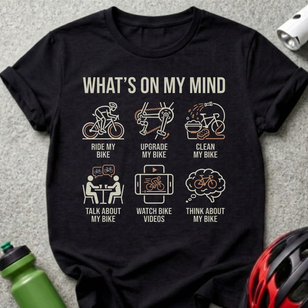 Black t-shirt with text and icons about cycling thoughts.