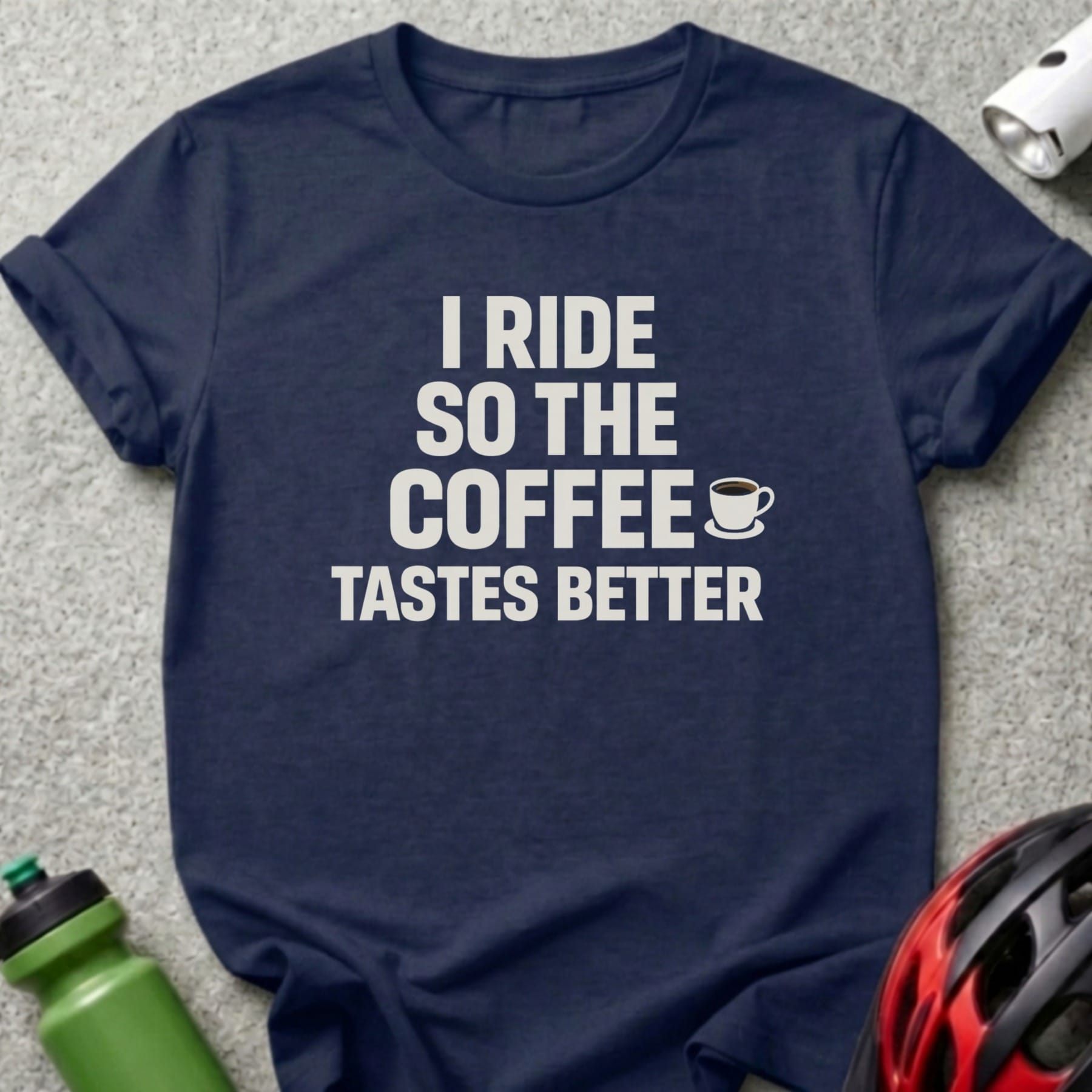 Navy t-shirt with white text "I RIDE SO THE COFFEE TASTES BETTER".