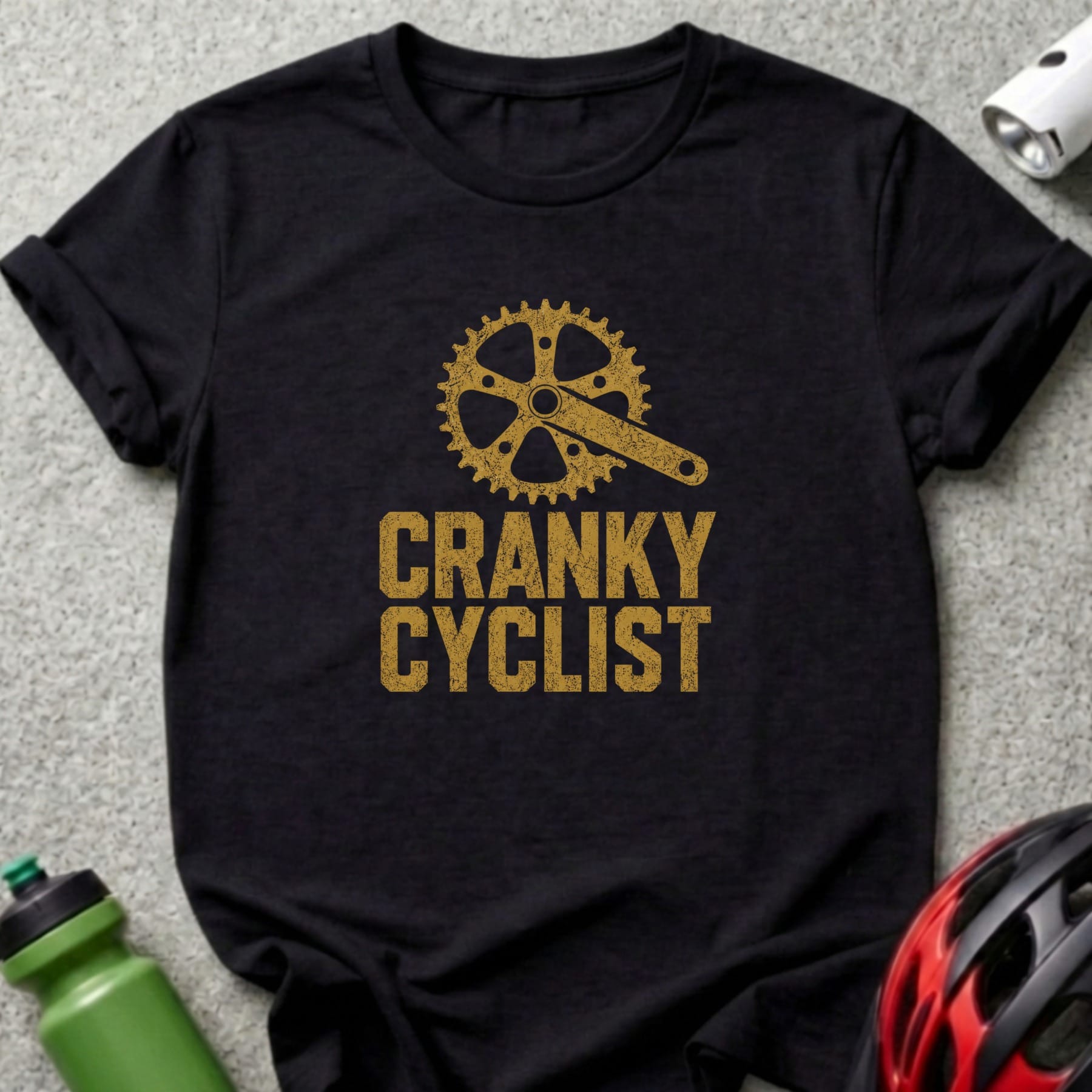 Black t-shirt with gold distressed graphic of a bike crank and "CRANKY CYCLIST" text.