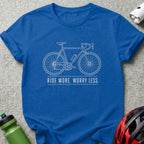 Blue t-shirt with white outline of a bicycle and text "RIDE MORE. WORRY LESS."