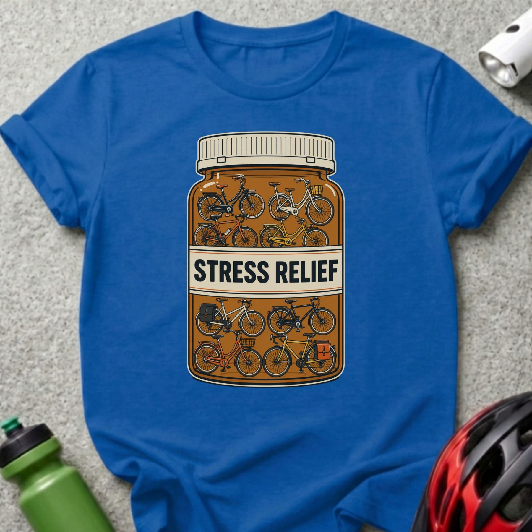 Blue t-shirt with a pill bottle labeled "Stress Relief" filled with bicycles.