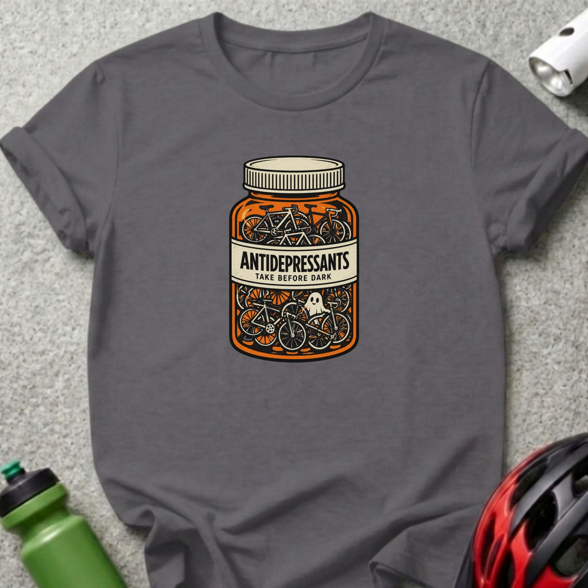 Dark gray t-shirt with pill bottle design featuring bicycles and text.