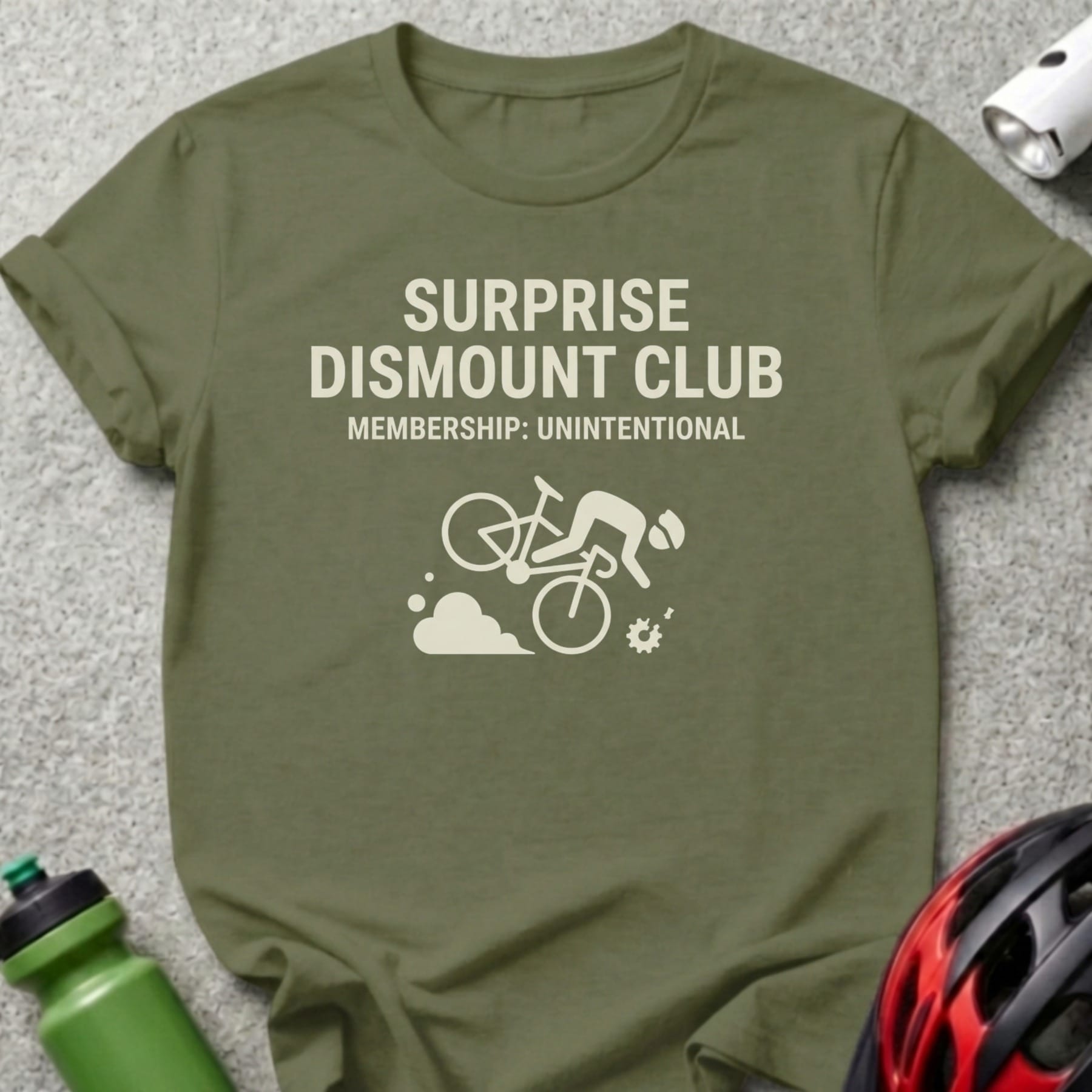 Olive green t-shirt with "Surprise Dismount Club" and bicycle graphic.