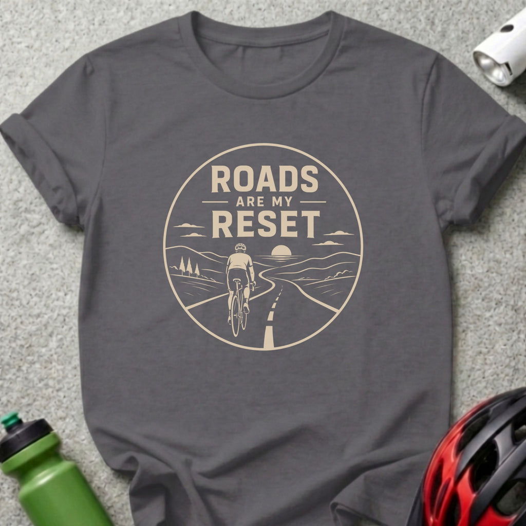 Dark grey t-shirt with "ROADS ARE MY RESET" text and cyclist graphic.