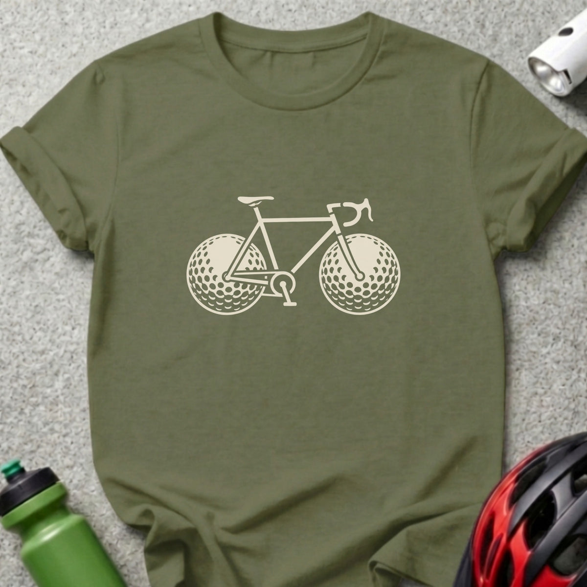 Olive green crew neck t-shirt featuring a graphic of a bicycle with golf balls for wheels.