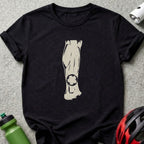 Black t-shirt with a stylized image of a leg and a bicycle gear.