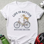 White t-shirt with "Life is Better With a Bike and a Dog" text and dog on bicycle graphic.