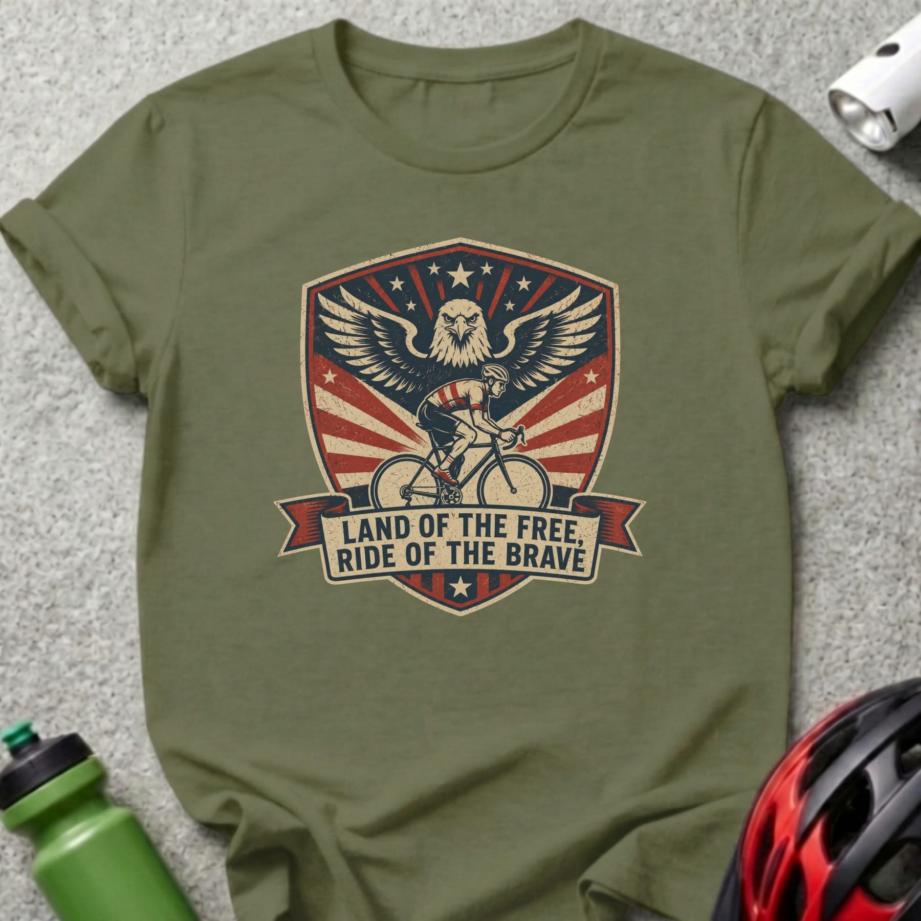 Olive green t-shirt with patriotic eagle and cyclist graphic.