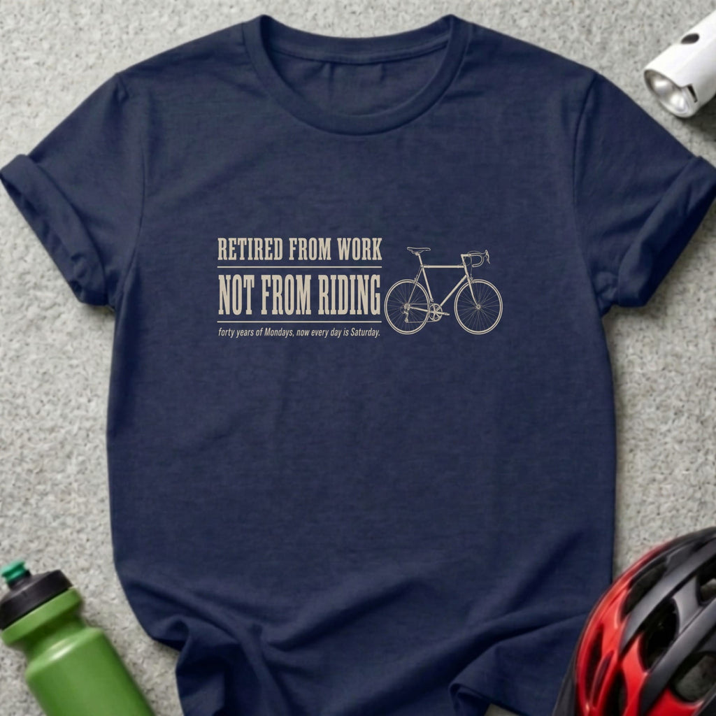 Navy t-shirt with "Retired from Work, Not from Riding" text and bicycle graphic.
